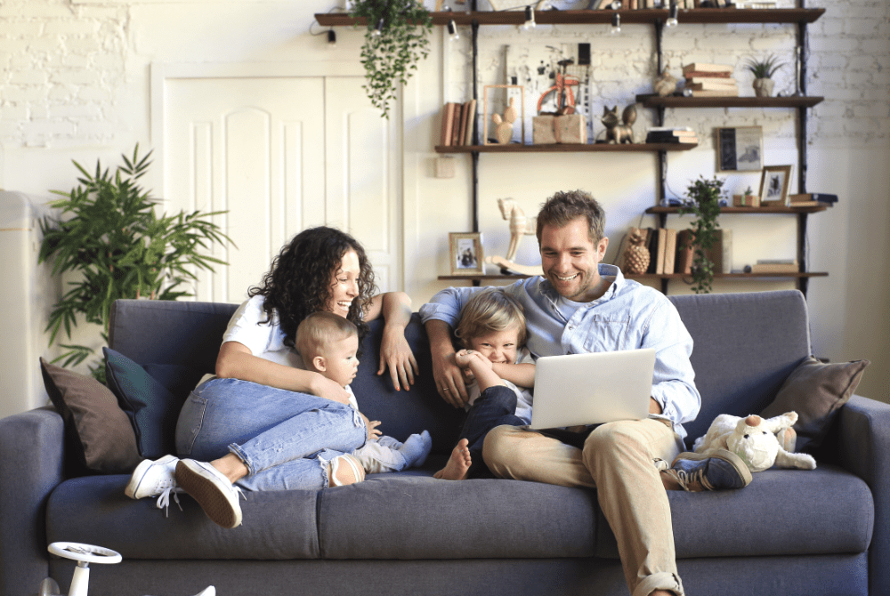 family and child on sofs